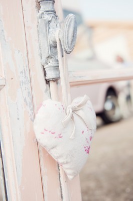 Peony and Sage fabric heart hanging on a mirror