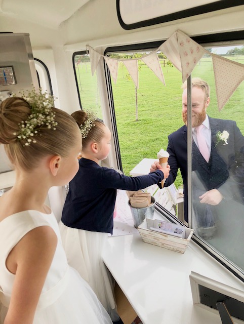 Bridesmaid serving ice cream